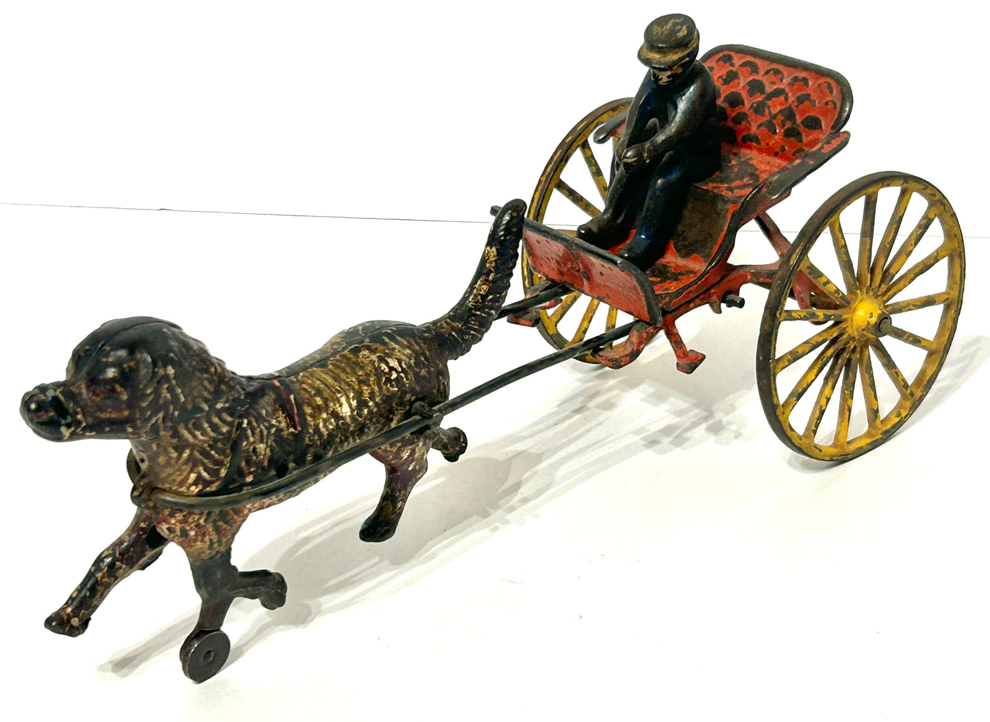 CAST IRON ANTIQUE TOY OF BUGGY DRAWN BY DOG