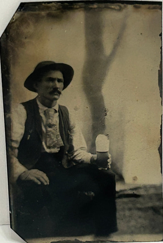 TINTYPE OF MAN HOLDING GLASS OF BEER