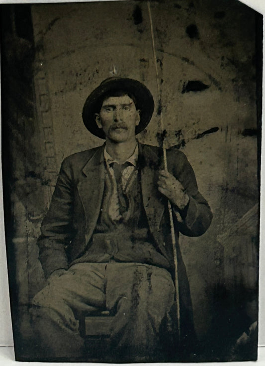 TINTYPE PHOTO OF MAN HOLDING FISHING POLE