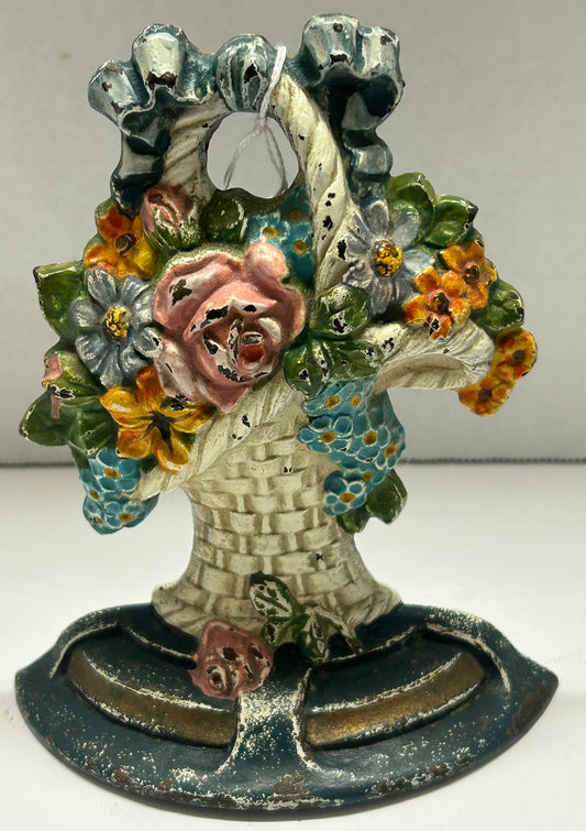 CAST IRON FLORAL FRENCH BASKET DOOR STOP