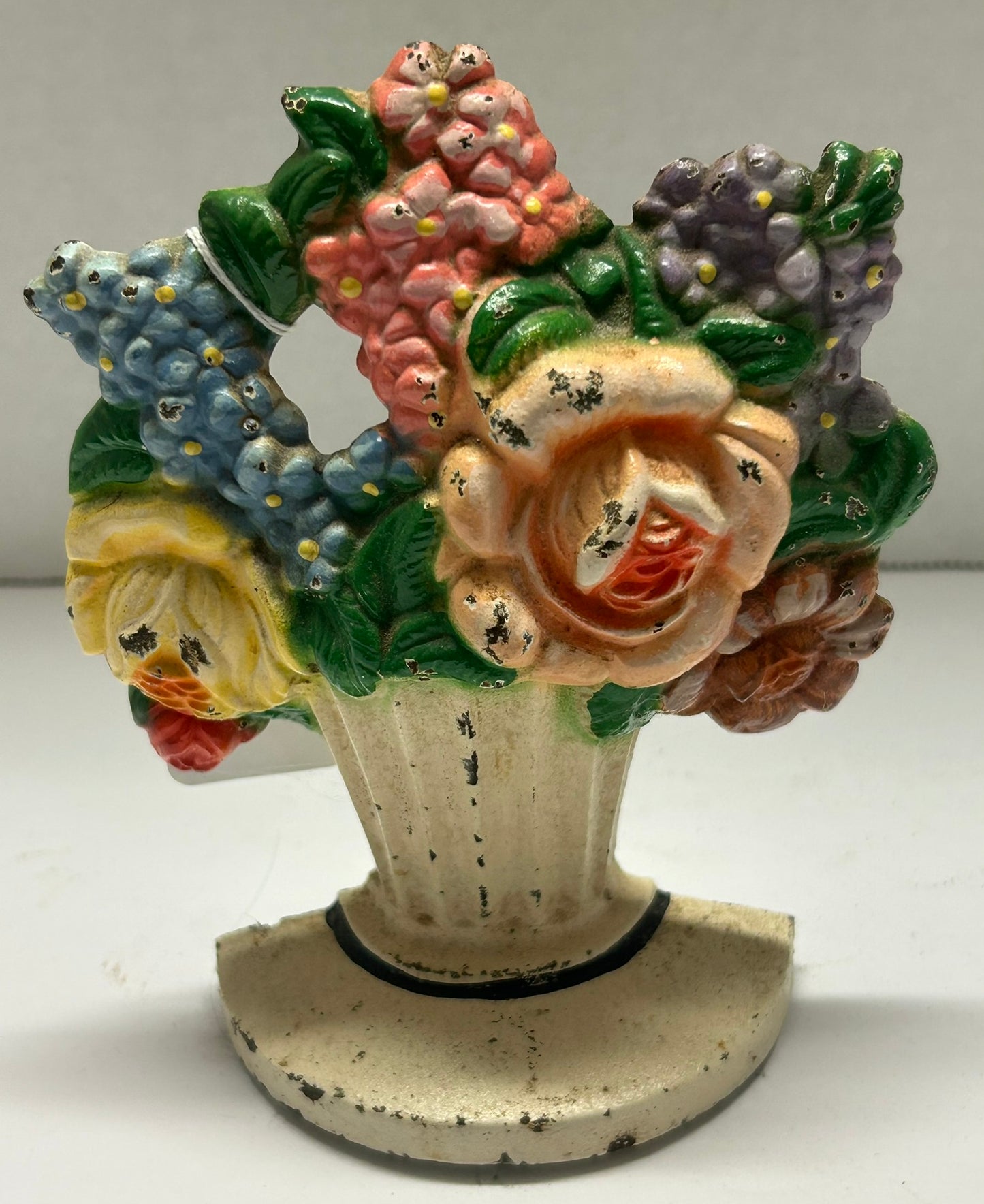 CAST IRON FLORAL DOOR STOP