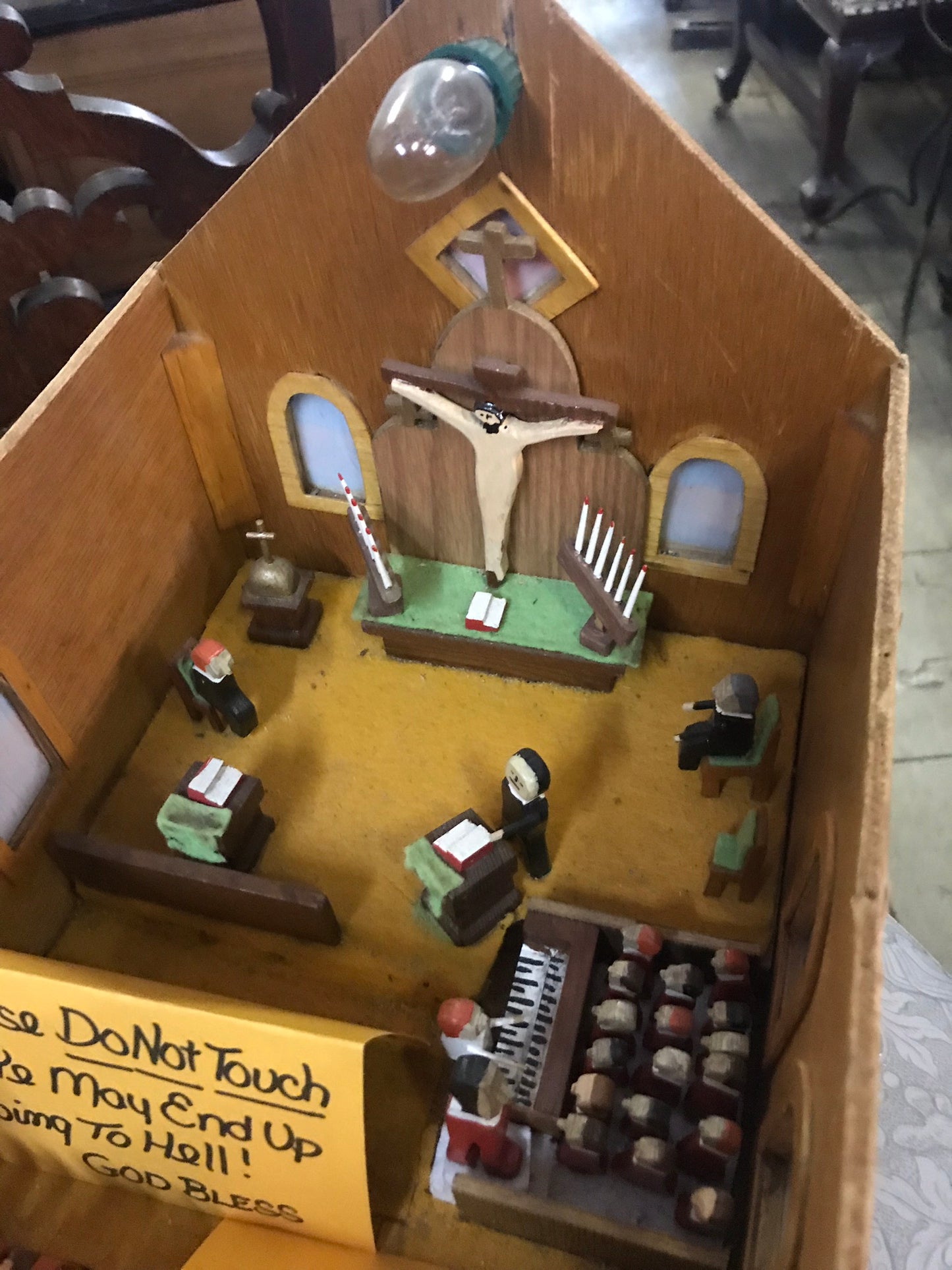 FOLK ART CHURCH INTERIOR WITH PEOPLE