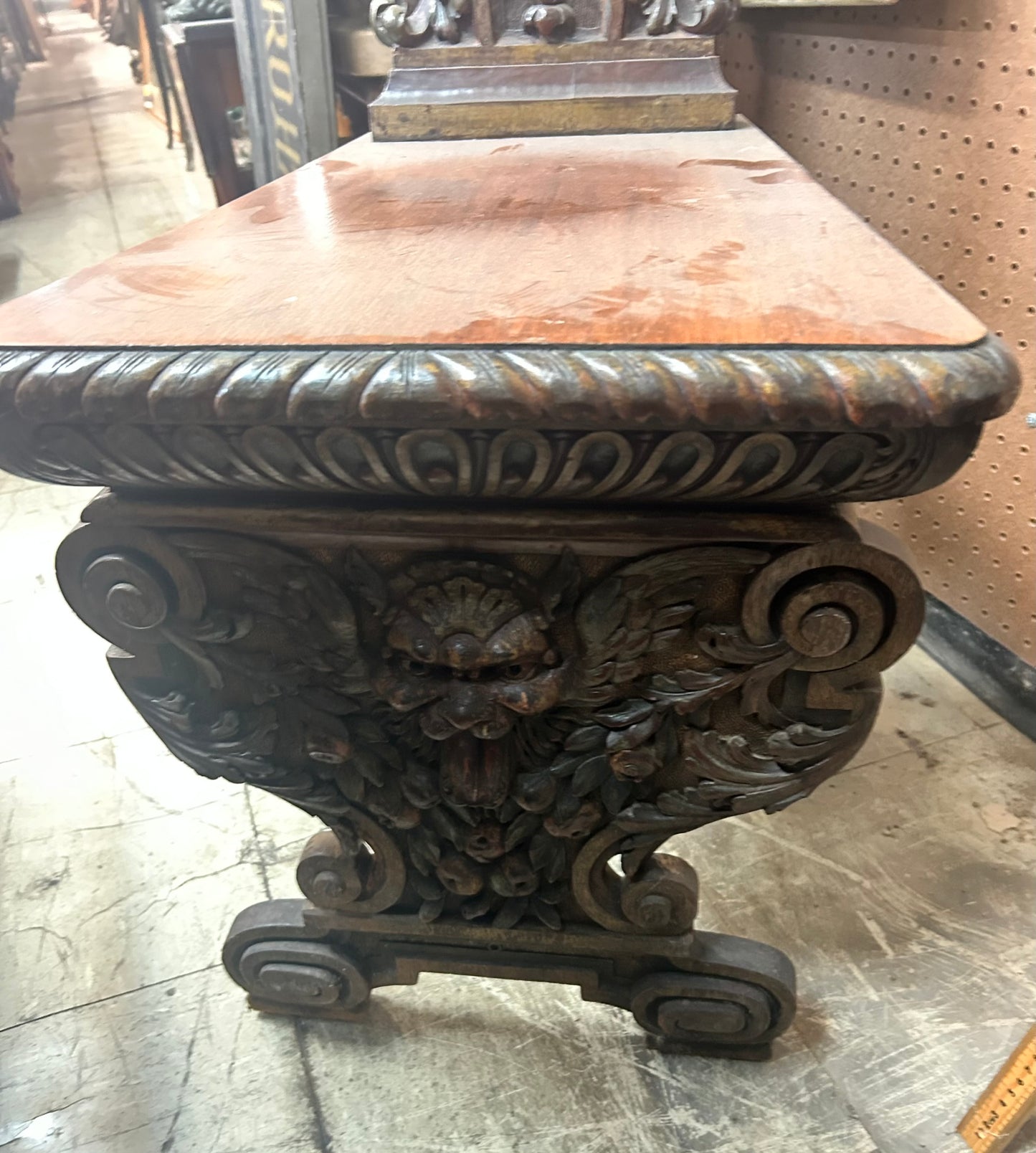 CARVED ANTIQUE CHAIR WITH FEMALE DECORATIONS