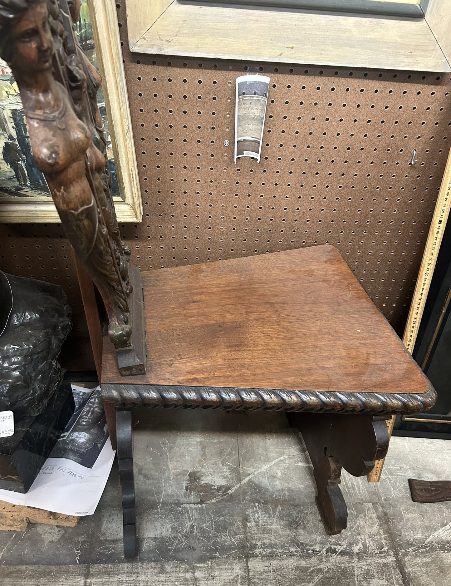 CARVED ANTIQUE CHAIR WITH FEMALE DECORATIONS