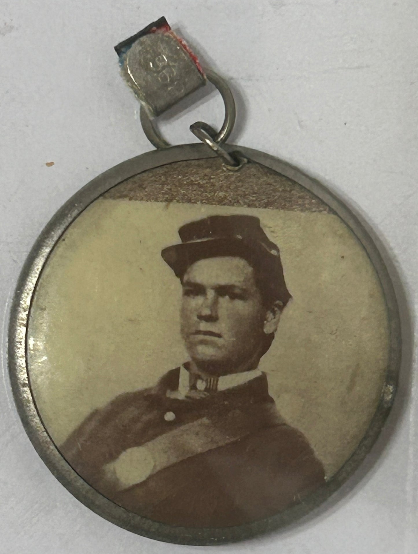 CIVIL WAR SOLDIER PHOTO MEDALLION WITH REVERSE PHOTO OF HIM LATER AS PRIEST