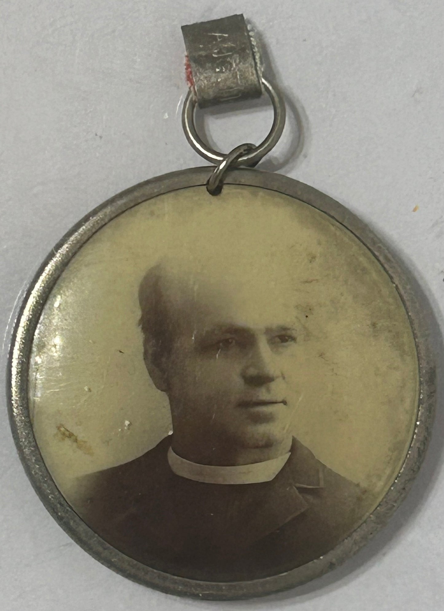 CIVIL WAR SOLDIER PHOTO MEDALLION WITH REVERSE PHOTO OF HIM LATER AS PRIEST