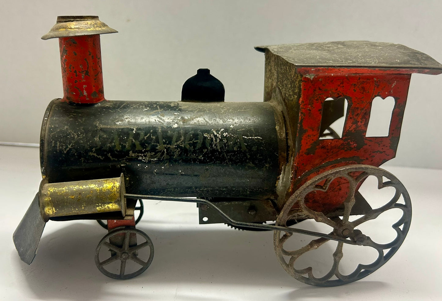 EARLY TIN CLOCKWORK WINDUP TOY FLOOR LOCOMOTIVE "SARATOGA"