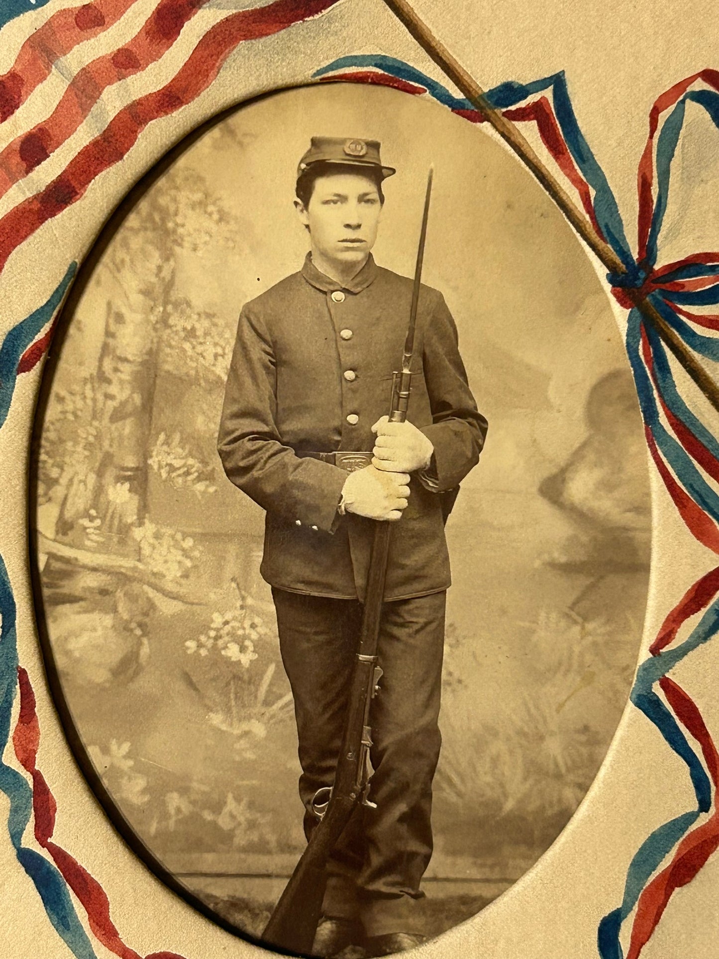 HAND PAINTED PATRIOTIC FLAG FRAME WITH 1888 PHOTO OF 16 YEAR OLD IDENTIFIED SOLDIER