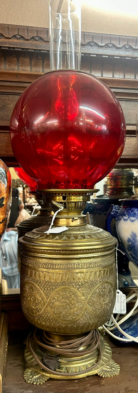 PERSIAN STYLE DECORATED BRASS LAMP BASE WITH RED GLOBE SHADE