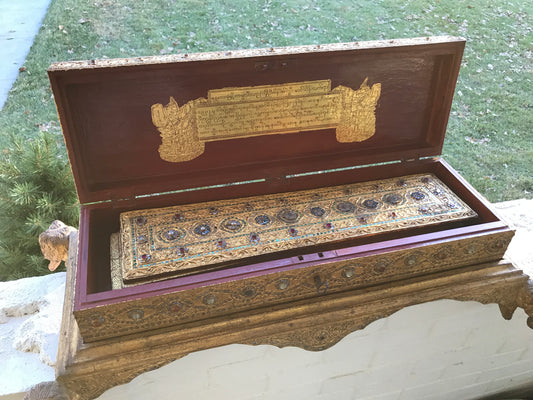 19TH CENTURY KAMMAVACA MANUSCRIPT IN GILT BOX