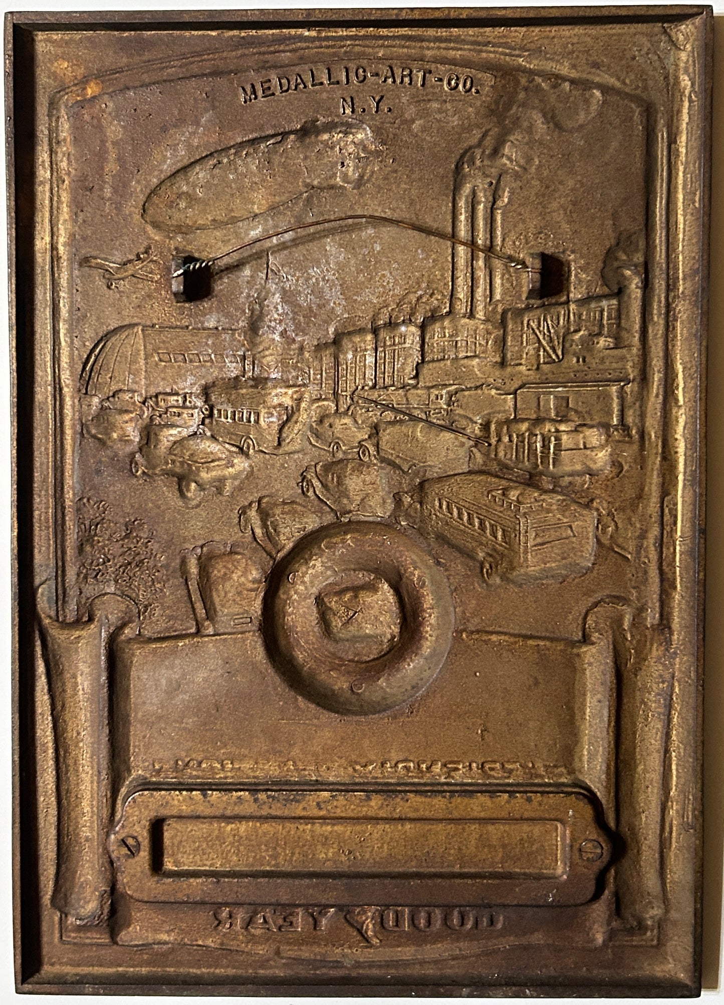 GOODYEAR CAST IRON 25 YEAR DEALER PLAQUE