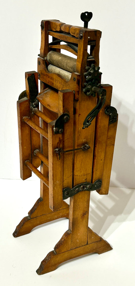 ANTIQUE SALESMAN SAMPLE CLOTHES WRINGER AND STAND