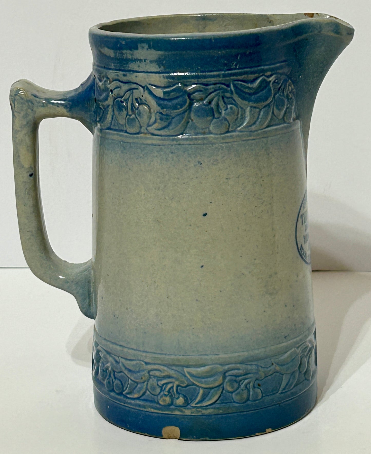 RED WING CHERRY BAND ADVERTISING PITCHER FOR IDA GROVE, IOWA