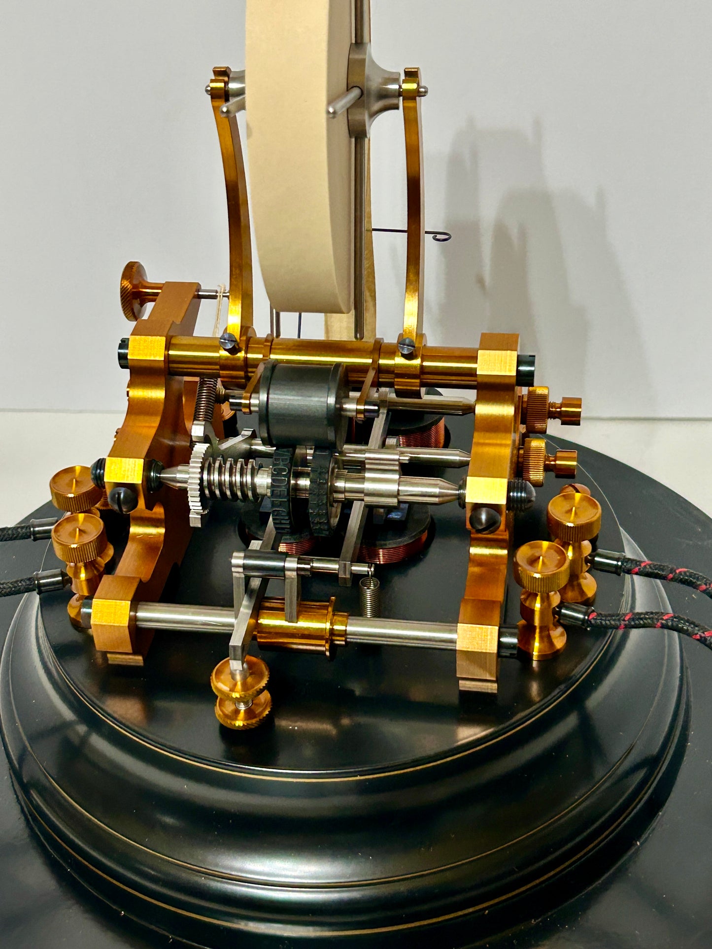 STOCK TICKER TAPE MACHINE WITH GLASS DOME BY BERNER MACHINE LABS