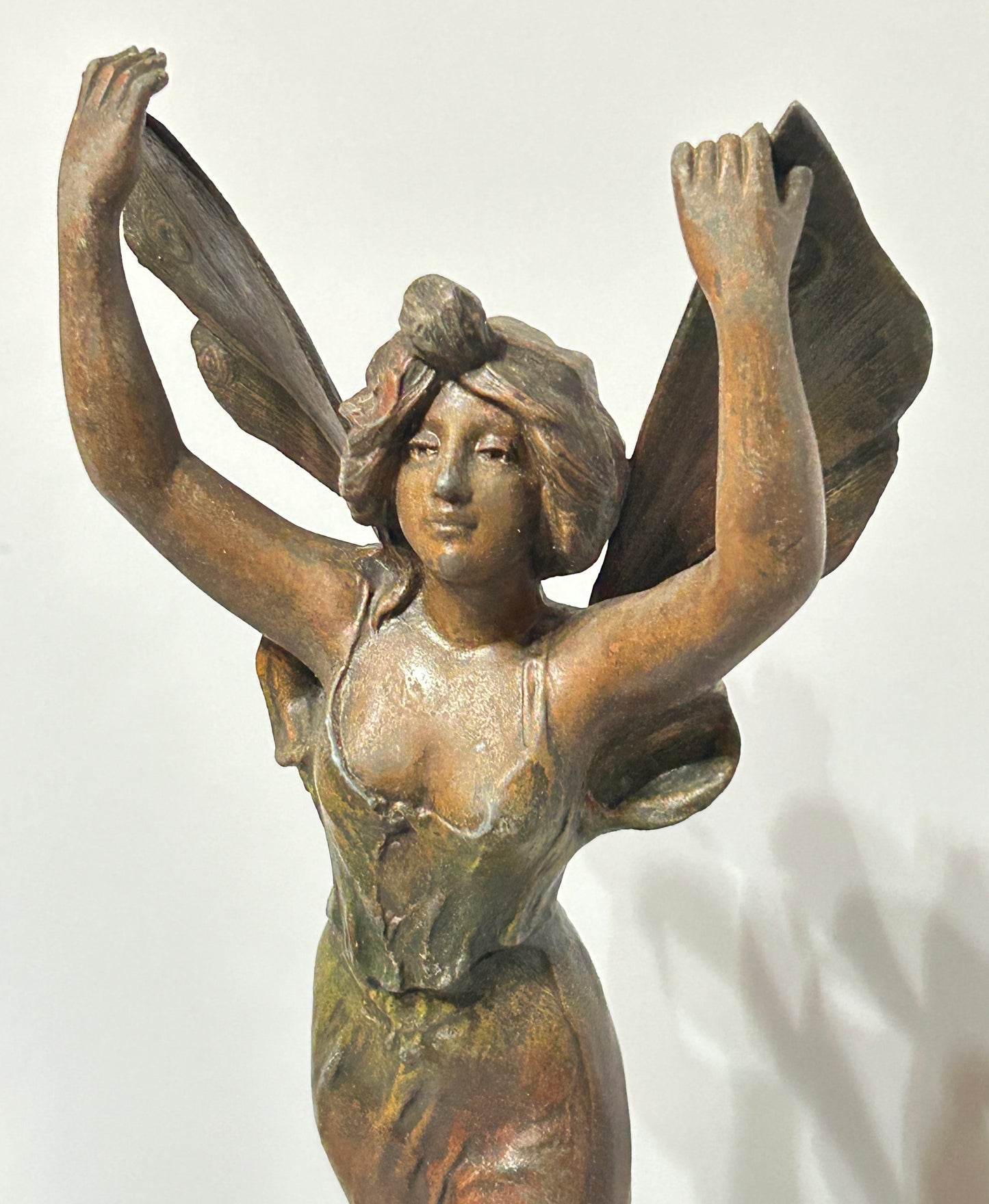 ANTIQUE THREE PIECE FIGURAL BUTTERFLY GIRL CLOCK SET