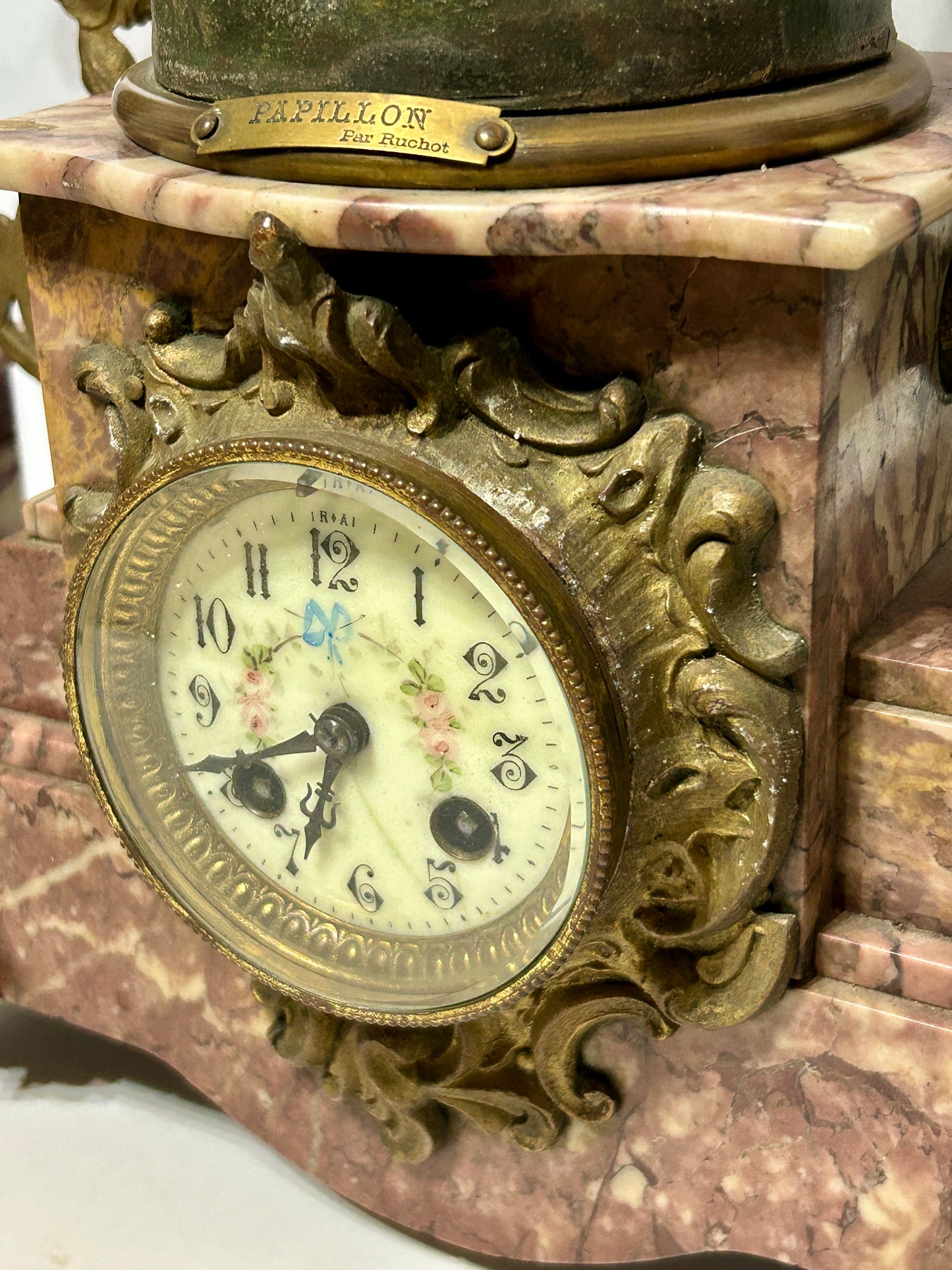 ANTIQUE THREE PIECE FIGURAL BUTTERFLY GIRL CLOCK SET