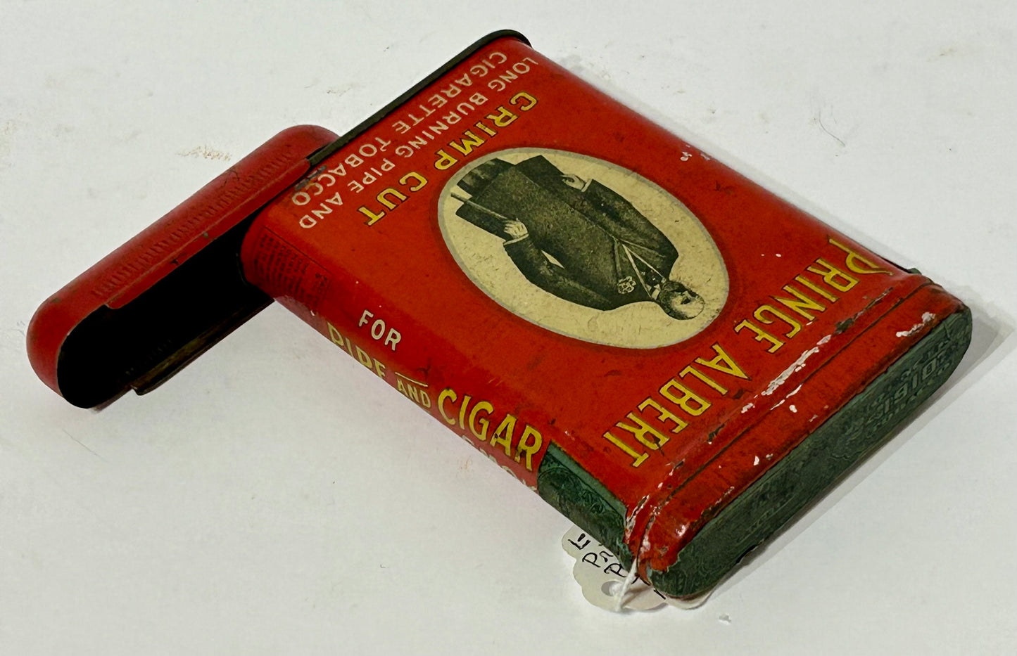 PRINCE ALBERT UNUSUAL TOBACCO POCKET TIN WITH MATCH HOLDER BOTTOM
