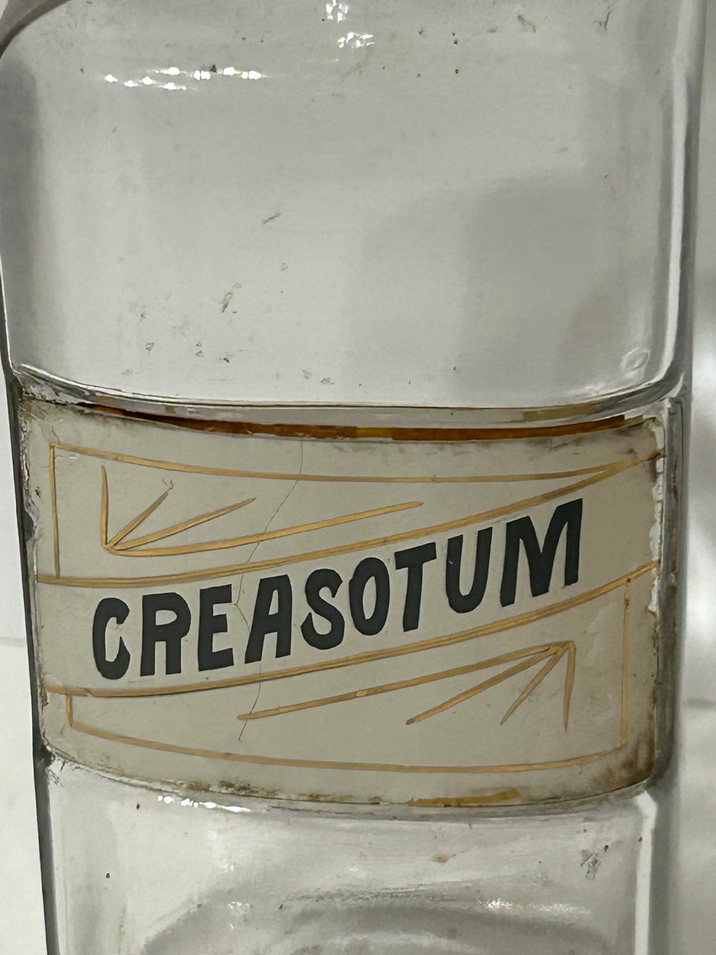 DRUGGIST LABEL UNDER GLASS ANTIQUE BOTTLE FOR "CREASOTUM"