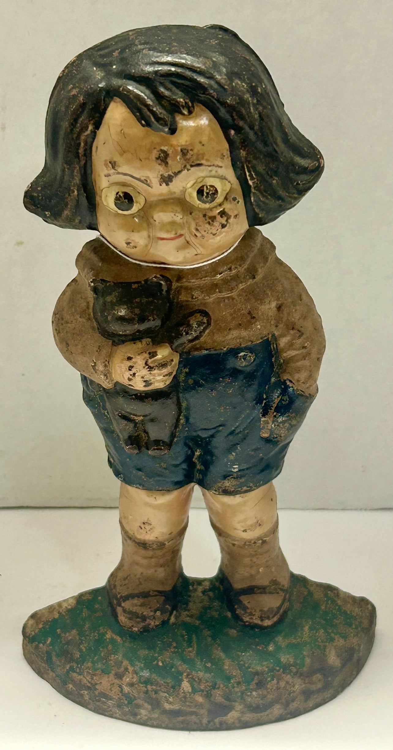 CAST IRON ANTIQUE DOOR STOP OF BOY & BEAR WITH ORIGINAL PAINT