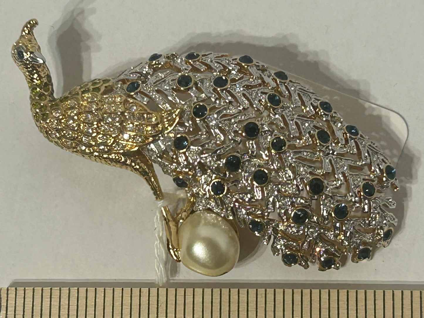 NOLAN MILLER PEACOCK BROOCH