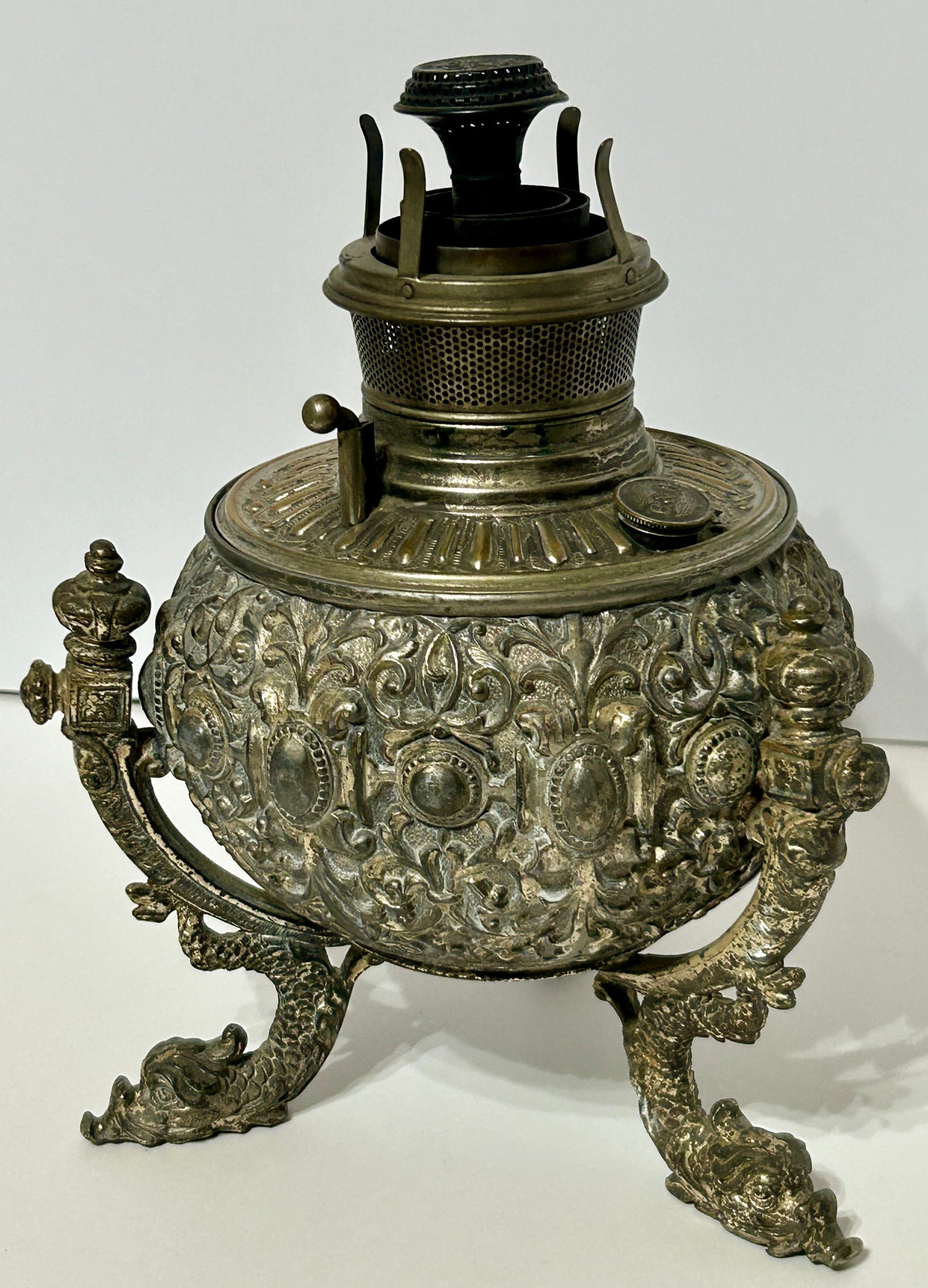 BRADLEY AND HUBBARD OIL LAMP BASE WITH FANCY EMBOSSED METAL DESIGN WITH SEA CREATURE LEGS