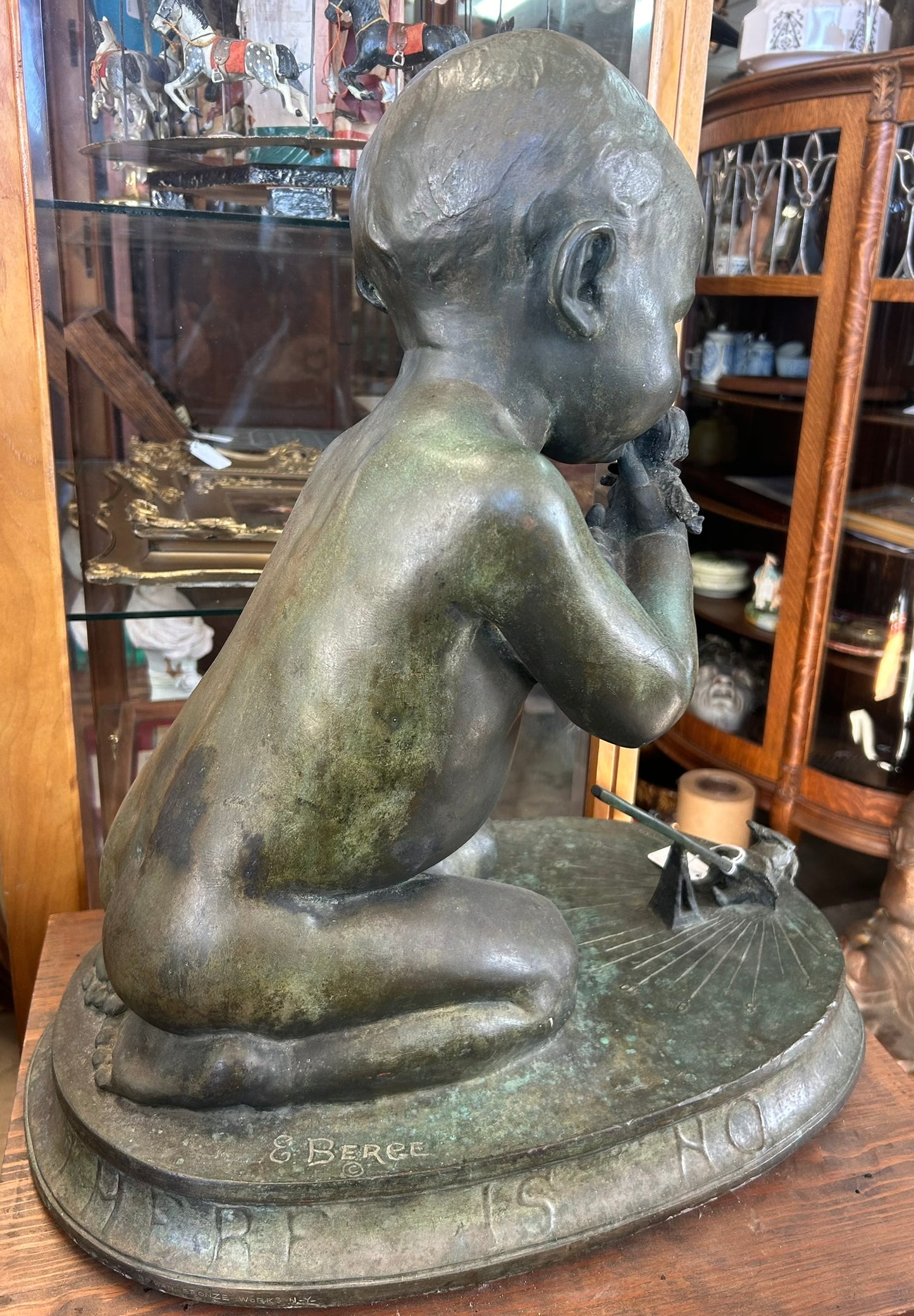 Edward Berge bronze figural sundial