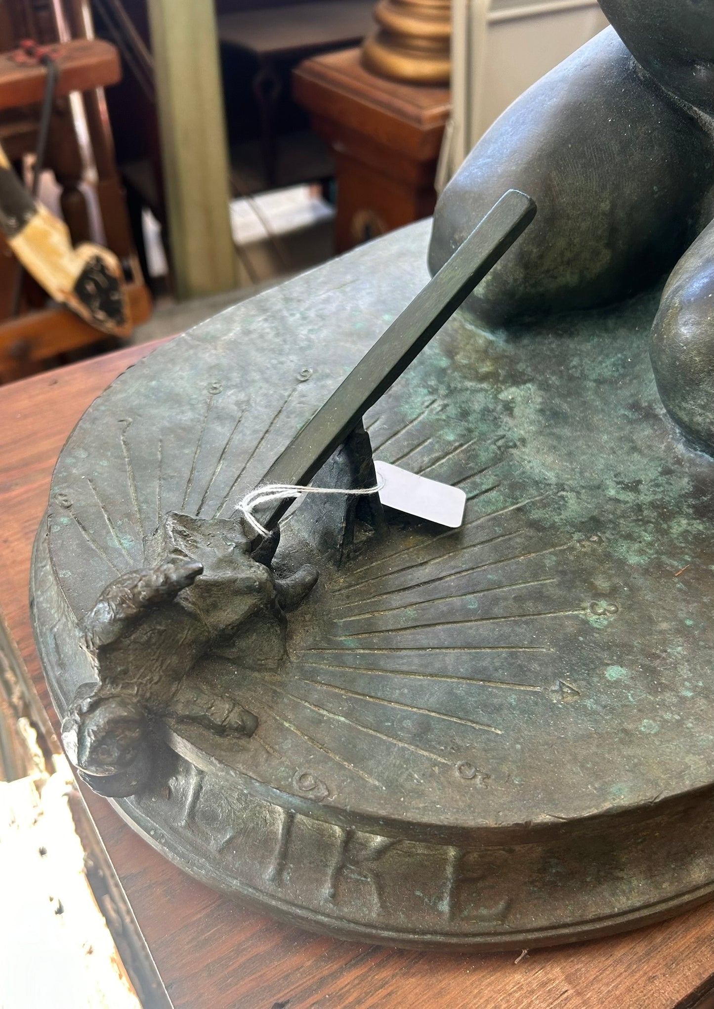 Edward Berge bronze figural sundial