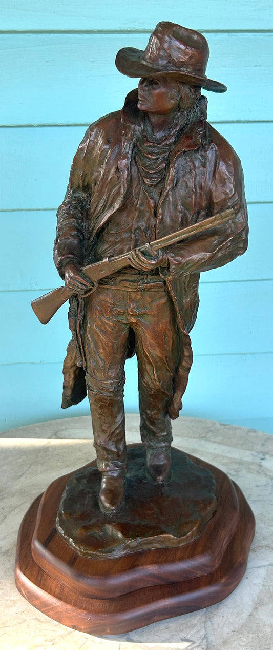 RUSSELL CHRISTENSEN, NEOLA IOWA BRONZE SCULPTURE COWBOY HOLDING RIFLE