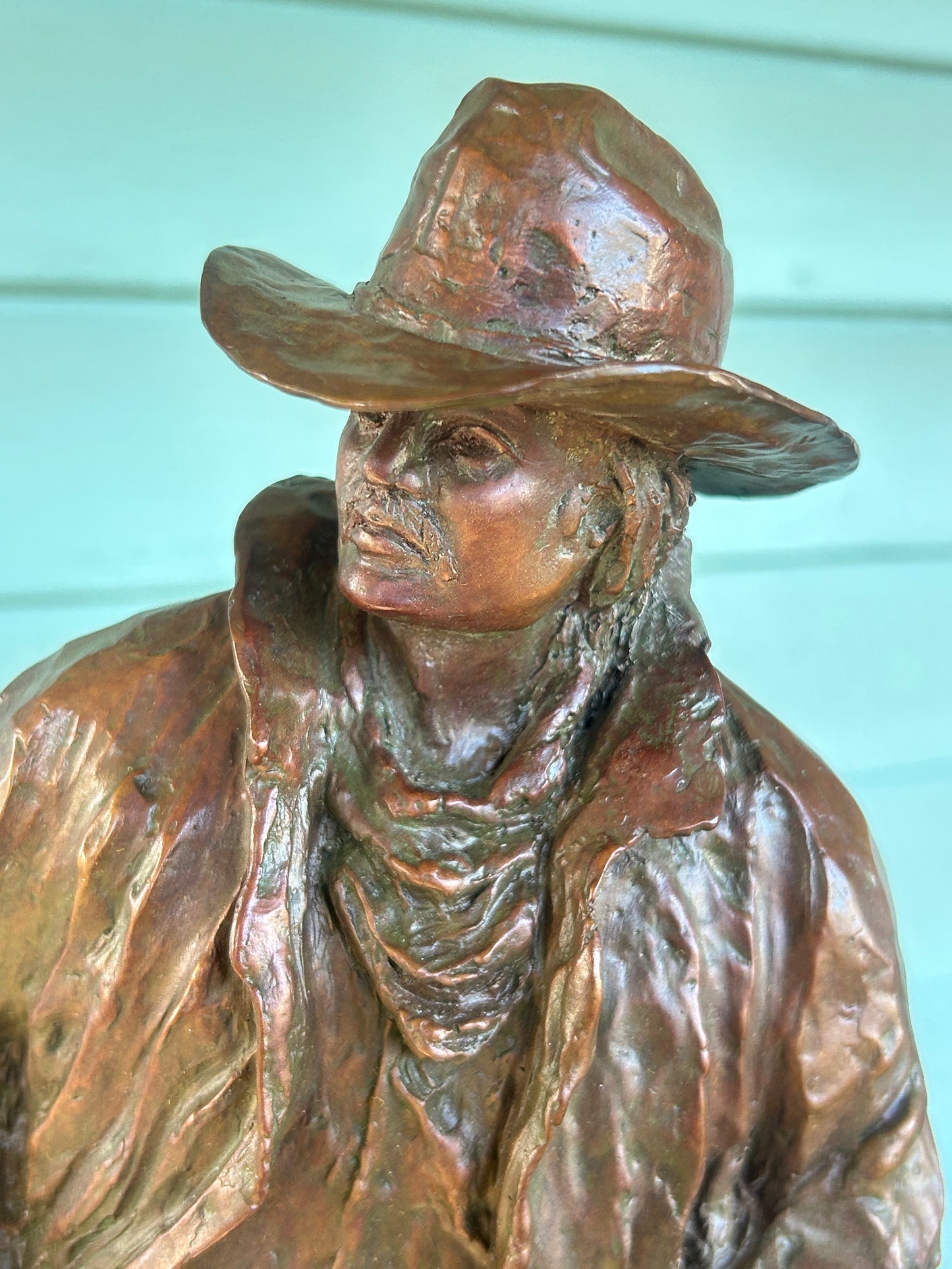 RUSSELL CHRISTENSEN, NEOLA IOWA BRONZE SCULPTURE COWBOY HOLDING RIFLE