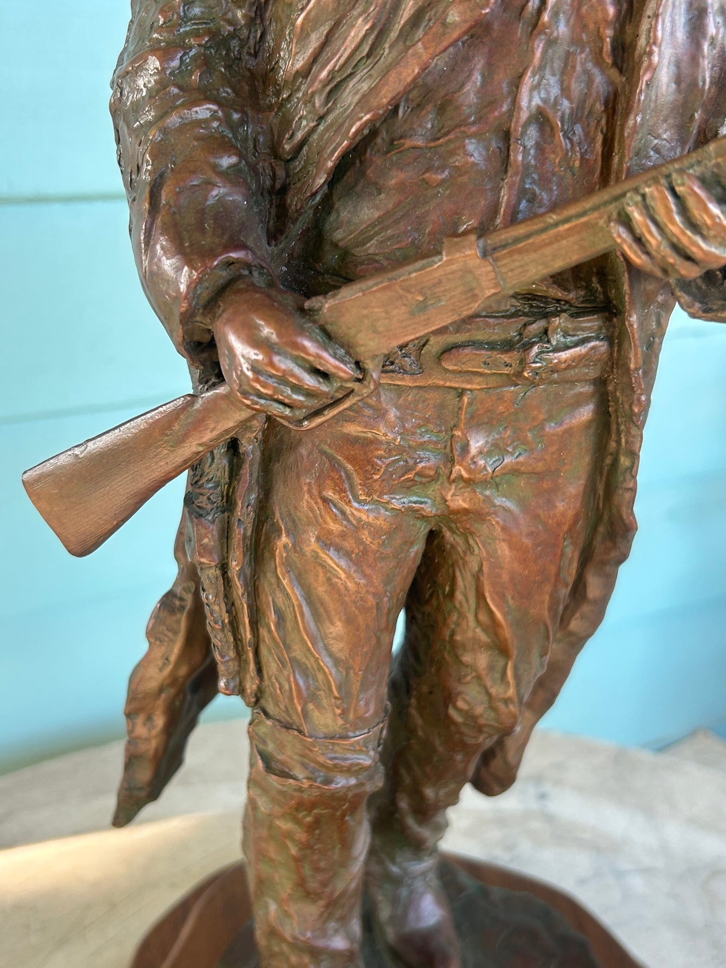 RUSSELL CHRISTENSEN, NEOLA IOWA BRONZE SCULPTURE COWBOY HOLDING RIFLE