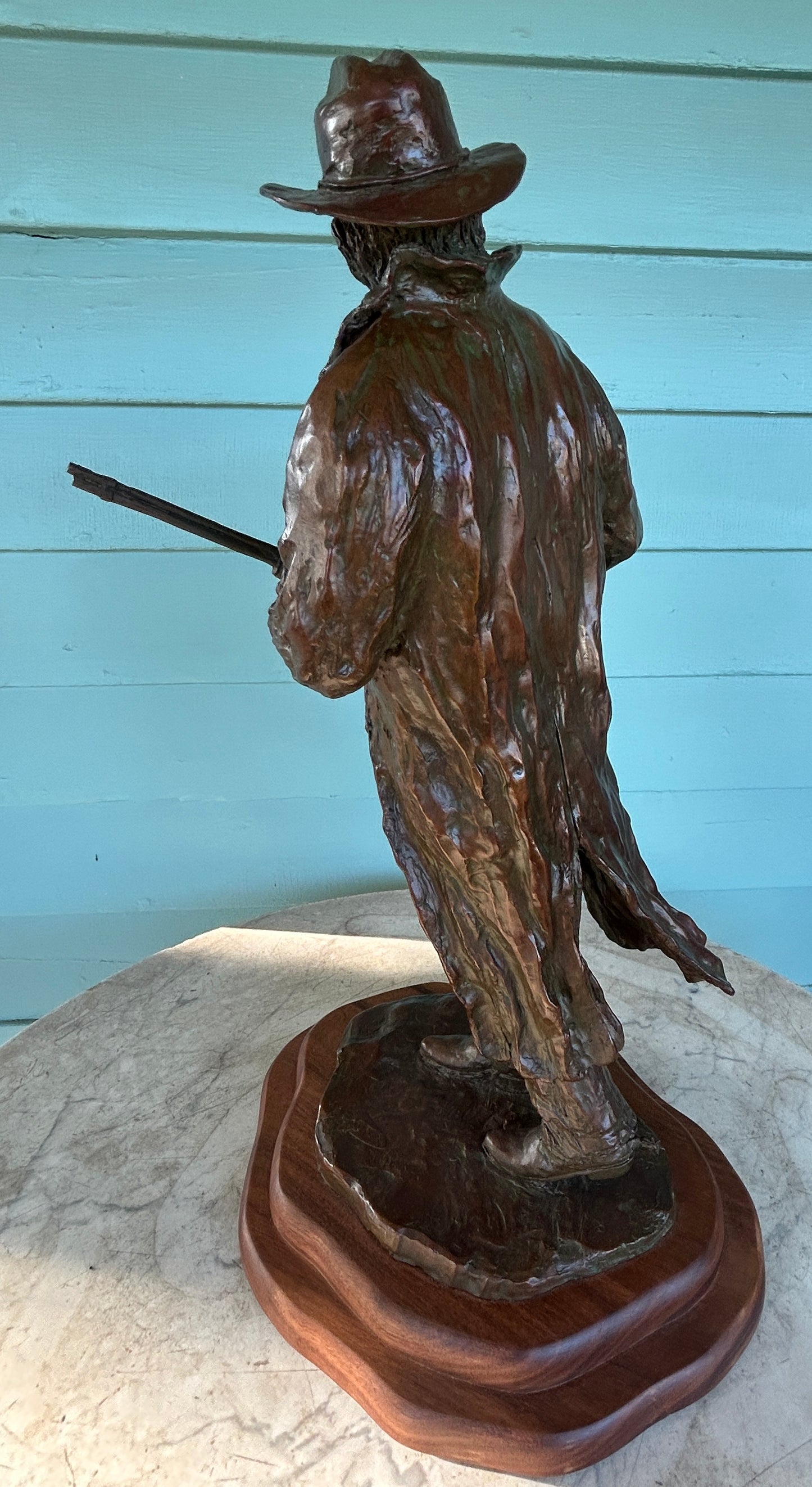 RUSSELL CHRISTENSEN, NEOLA IOWA BRONZE SCULPTURE COWBOY HOLDING RIFLE