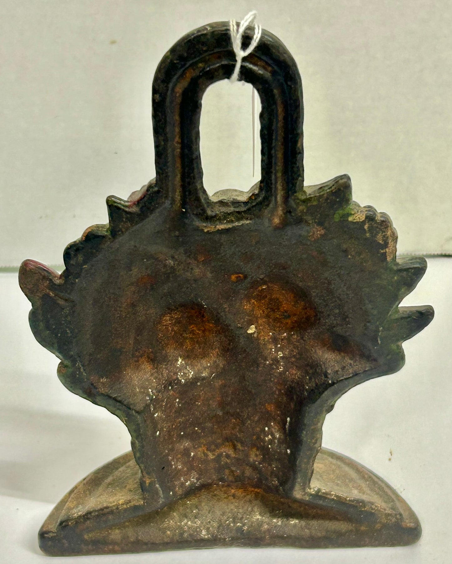 CAST IRON DOORSTOP OF ROSES AND MIXED FLOWERS