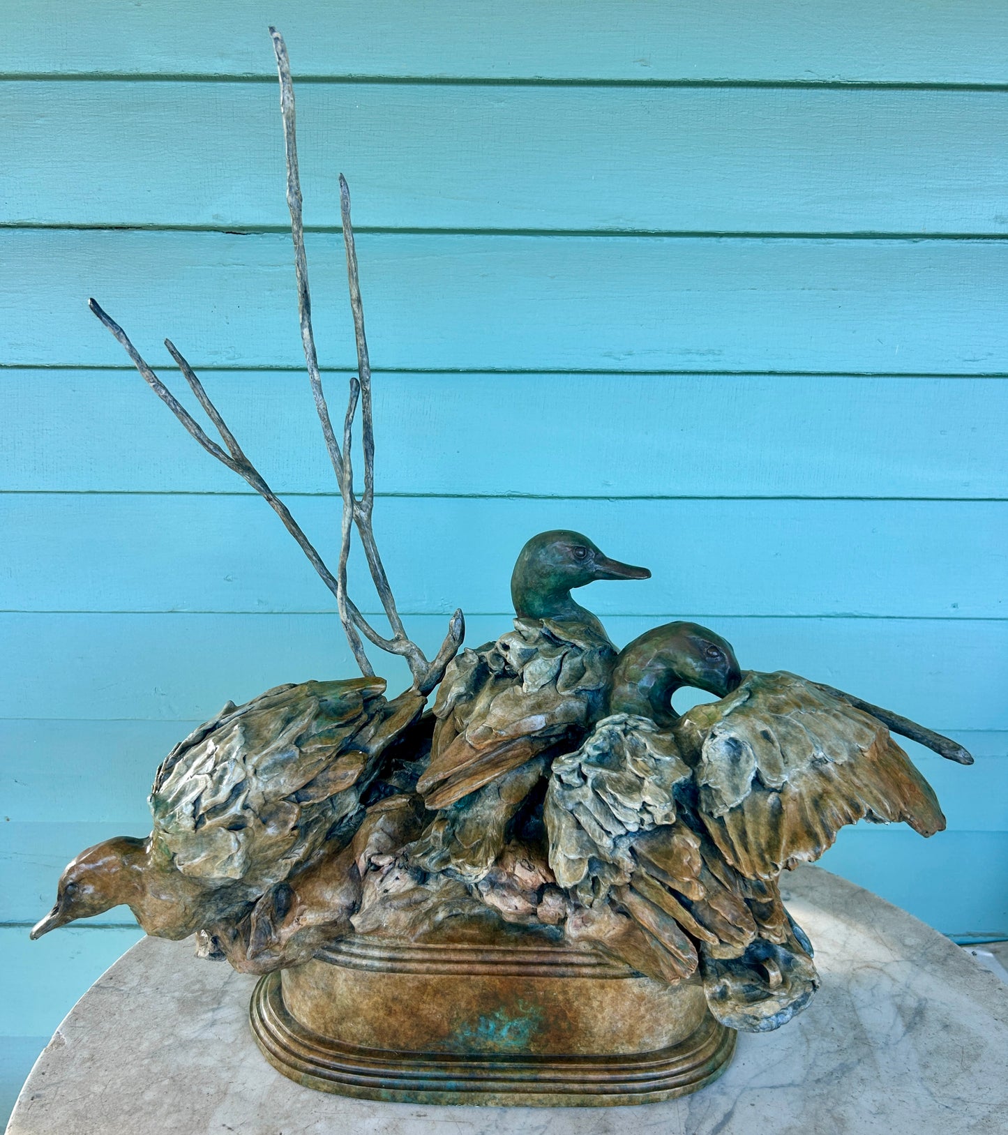 SHERRY SANDER BRONZE SCULPTURE OF THREE DUCKS