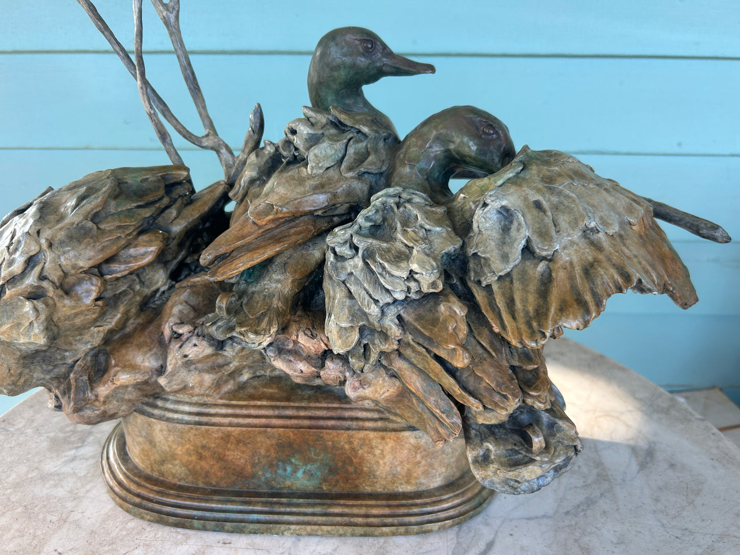 SHERRY SANDER BRONZE SCULPTURE OF THREE DUCKS