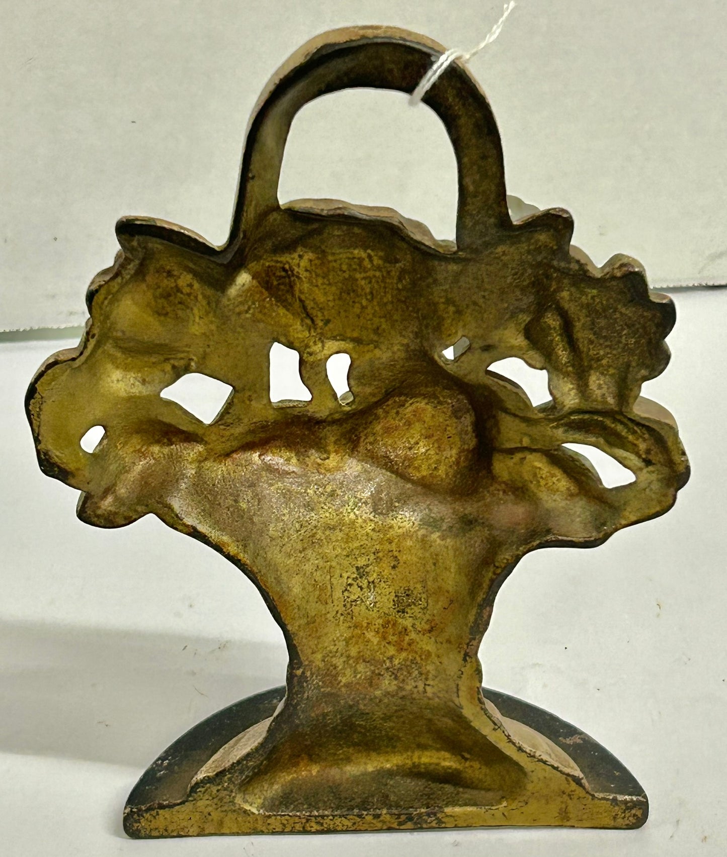 CAST IRON DOORSTOP OF FLOWERS IN WICKER BASKET
