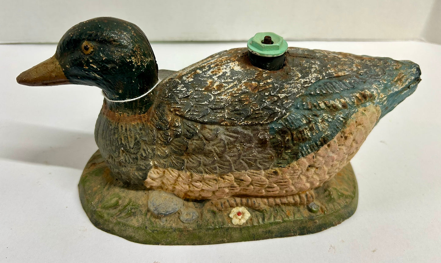 ANTIQUE CAST IRON FIGURAL DUCK ON GRASS LAWN SPRINKLER