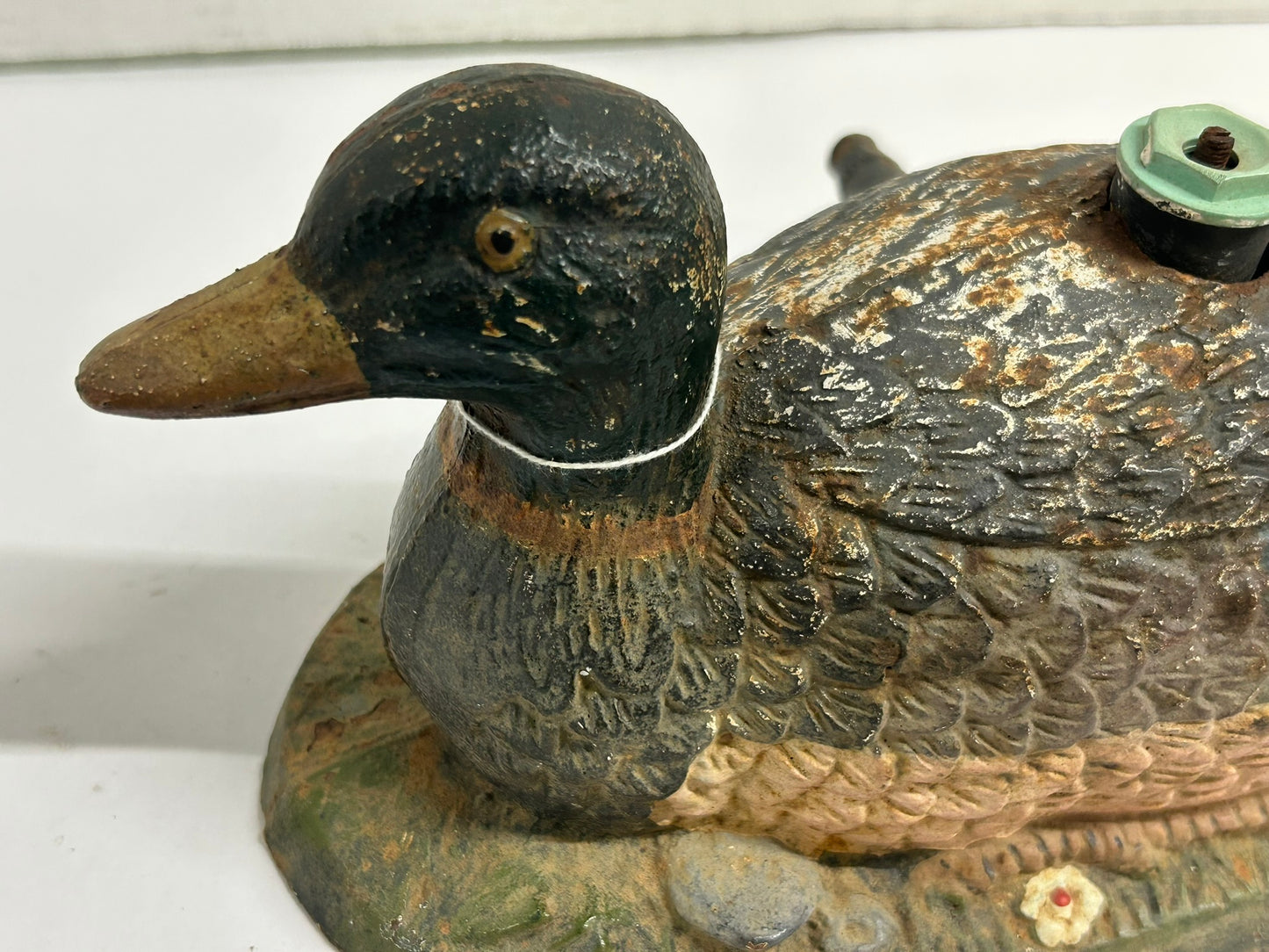 ANTIQUE CAST IRON FIGURAL DUCK ON GRASS LAWN SPRINKLER