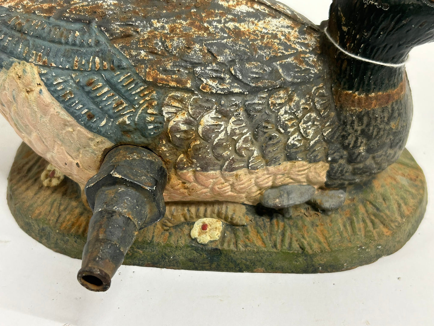 ANTIQUE CAST IRON FIGURAL DUCK ON GRASS LAWN SPRINKLER