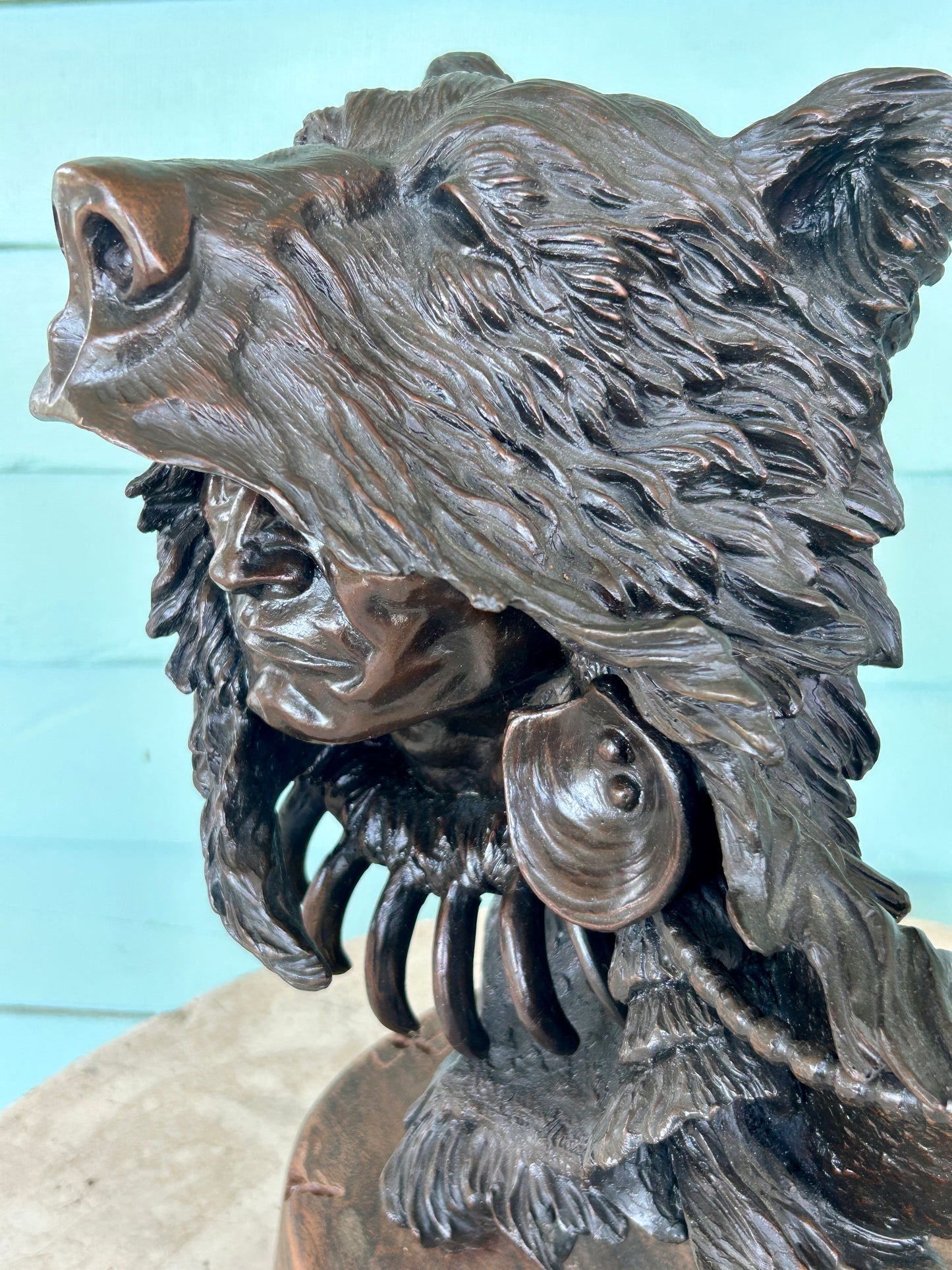 KEVIN MCCARTHY BRONZE SCULPTURE OF NATIVE AMERICAN WEARING BEAR HEAD DRESS