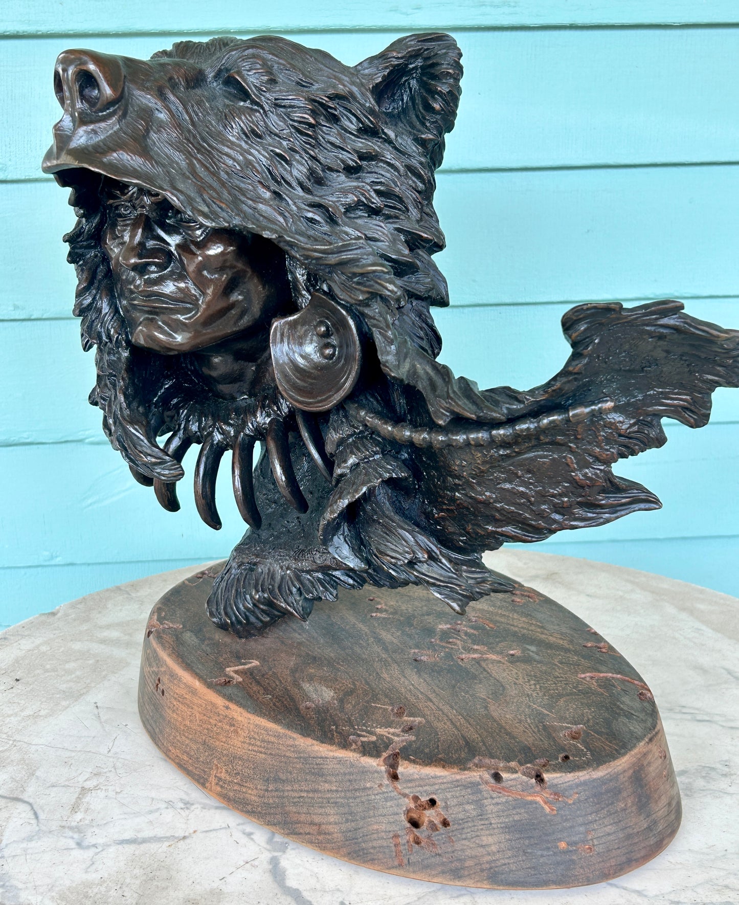 KEVIN MCCARTHY BRONZE SCULPTURE OF NATIVE AMERICAN WEARING BEAR HEAD DRESS