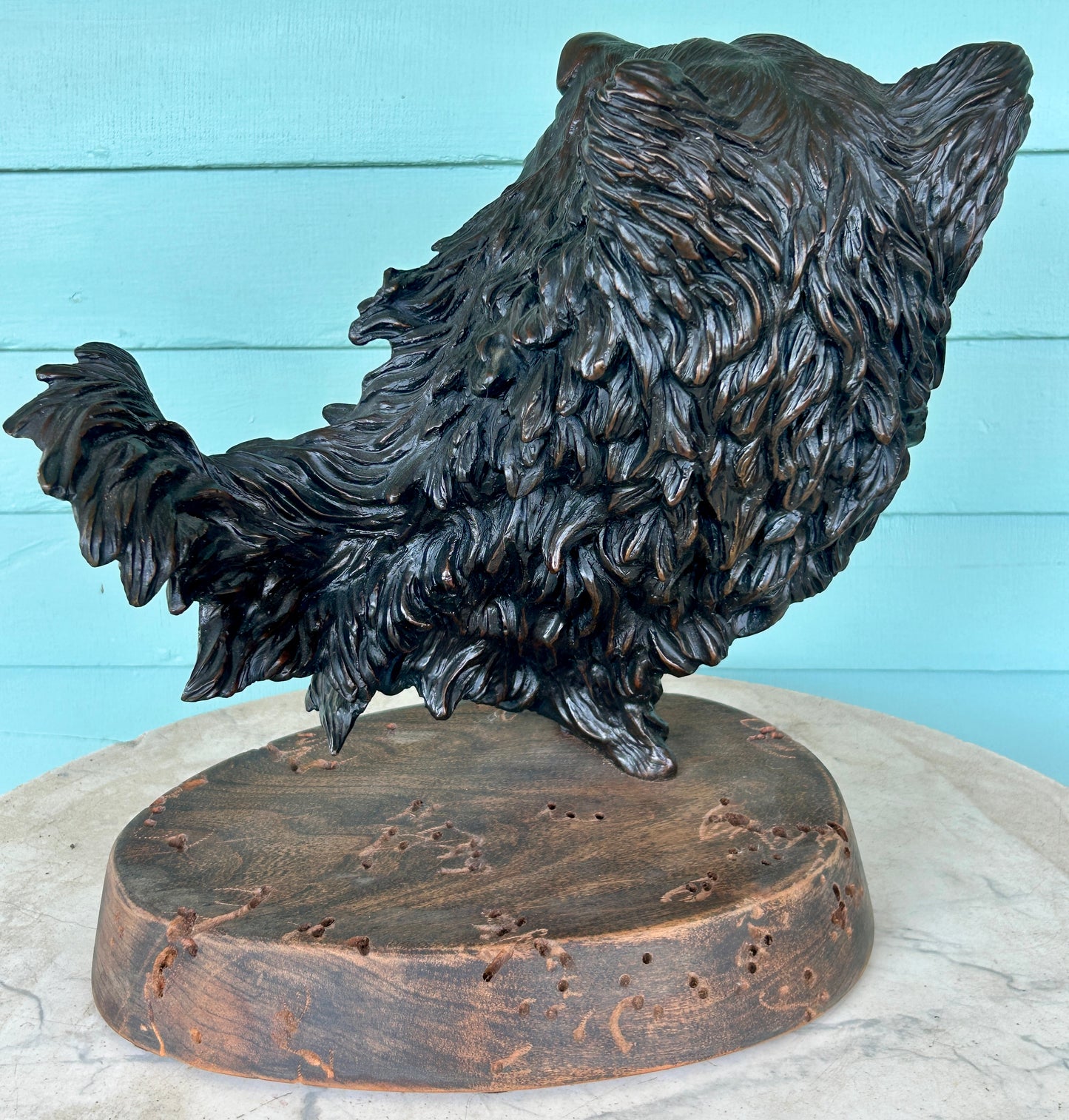 KEVIN MCCARTHY BRONZE SCULPTURE OF NATIVE AMERICAN WEARING BEAR HEAD DRESS
