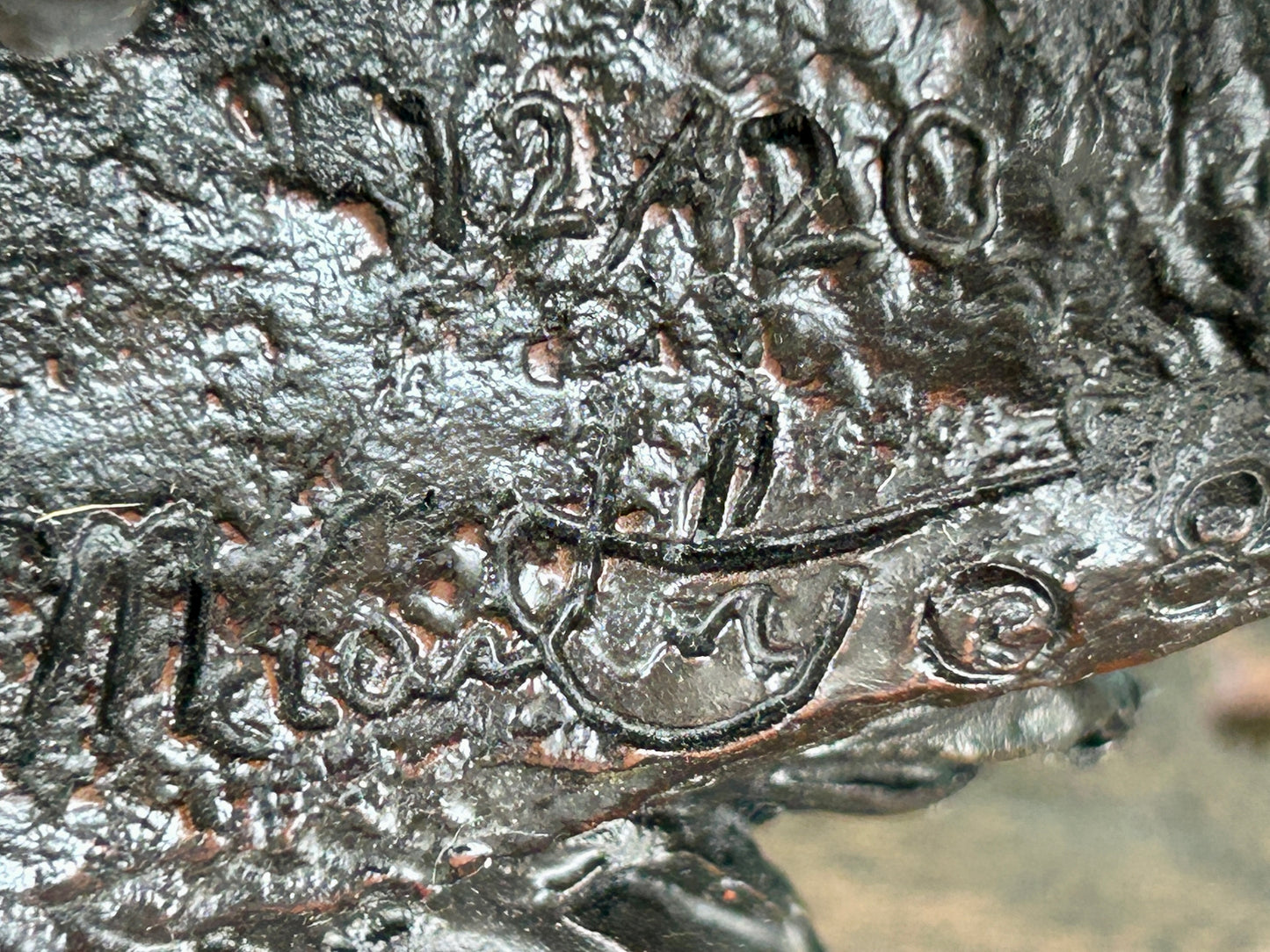 KEVIN MCCARTHY BRONZE SCULPTURE OF NATIVE AMERICAN WEARING BEAR HEAD DRESS