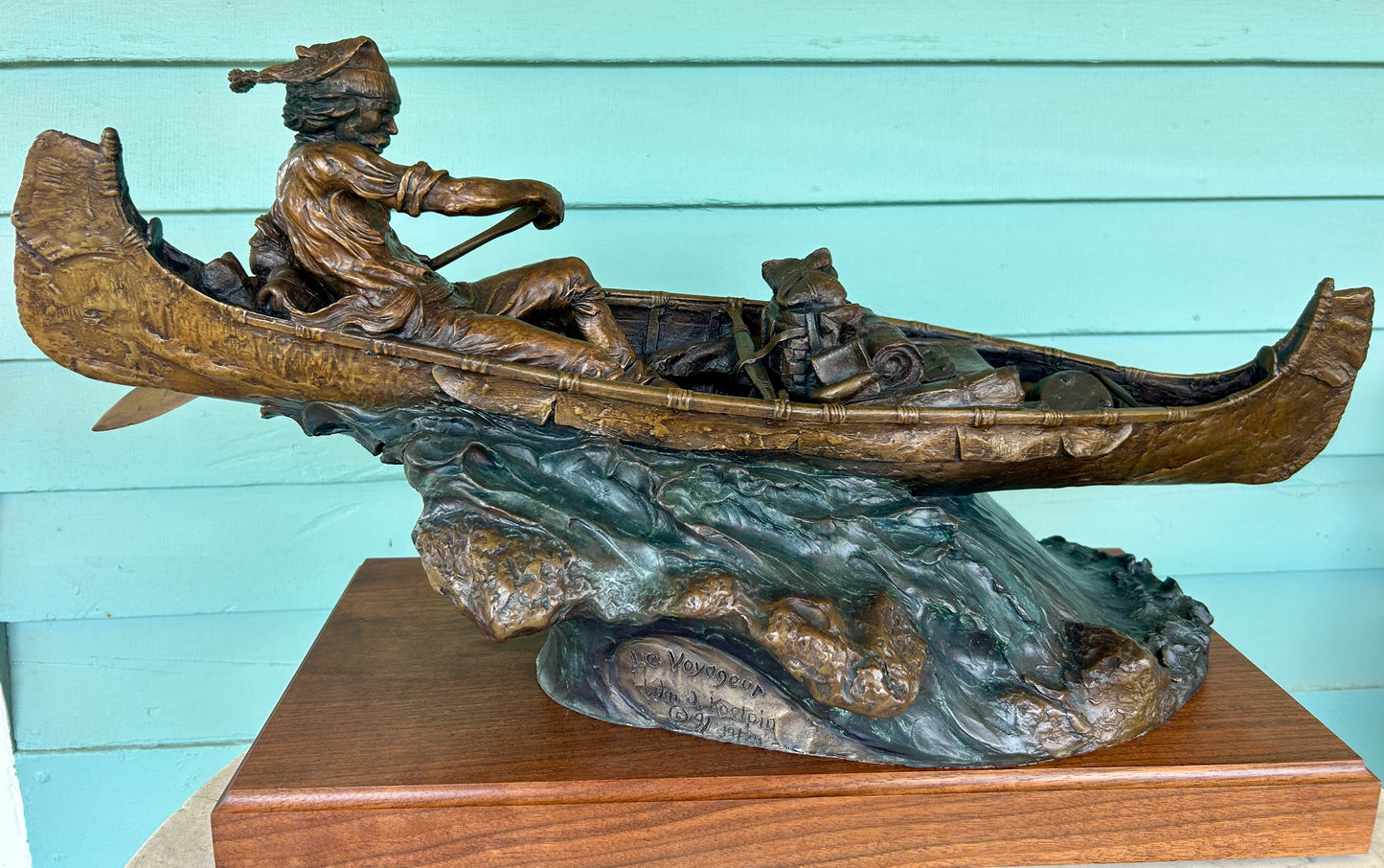 WILLIAM J. KOELPIN SR. WISCONSIN BRONZE SCULPTURE OF FUR TRAPPER IN BOAT