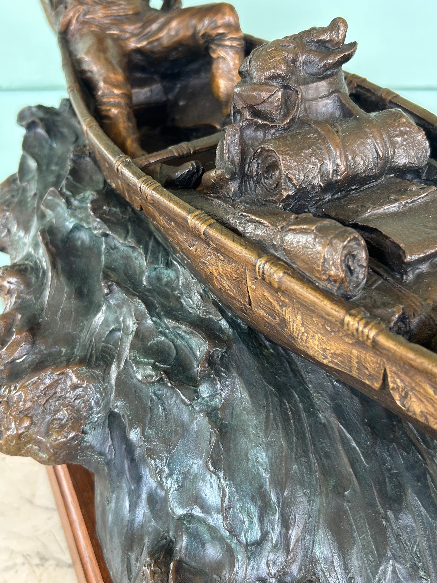 WILLIAM J. KOELPIN SR. WISCONSIN BRONZE SCULPTURE OF FUR TRAPPER IN BOAT