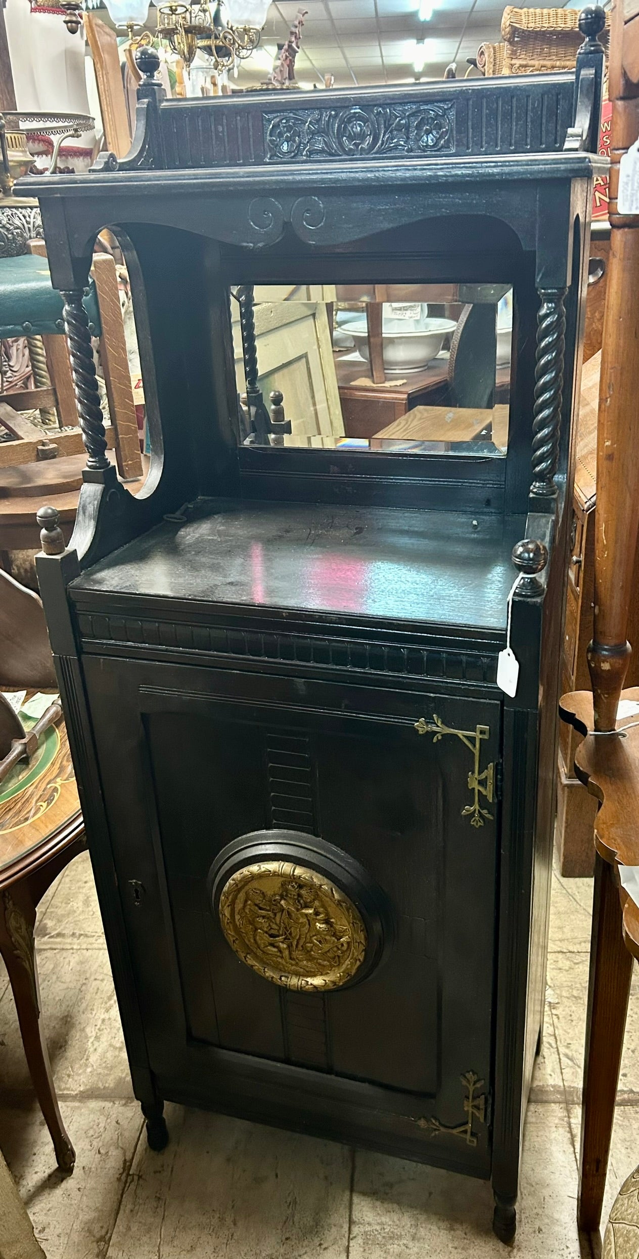 ANTIQUE BLACK EBONIZED MUSIC STAND WITH BRONZE PLAQUE ON DOOR, POTTIER AND STYMUS?