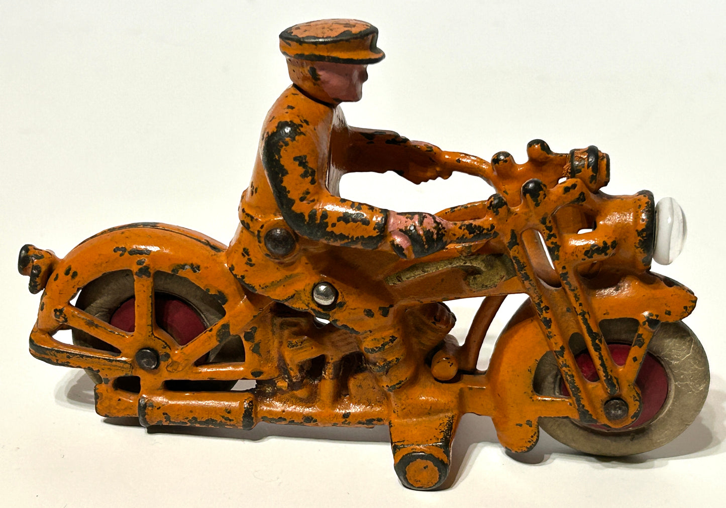 ANTIQUE CAST IRON TOY MOTORCYCLE WITH WORKING HEADLIGHT BY HUBLEY