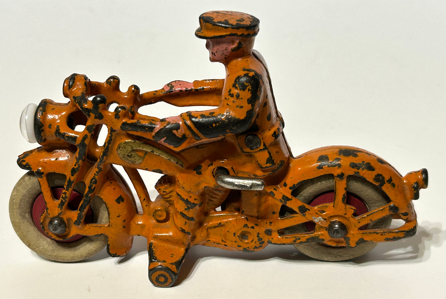 ANTIQUE CAST IRON TOY MOTORCYCLE WITH WORKING HEADLIGHT BY HUBLEY