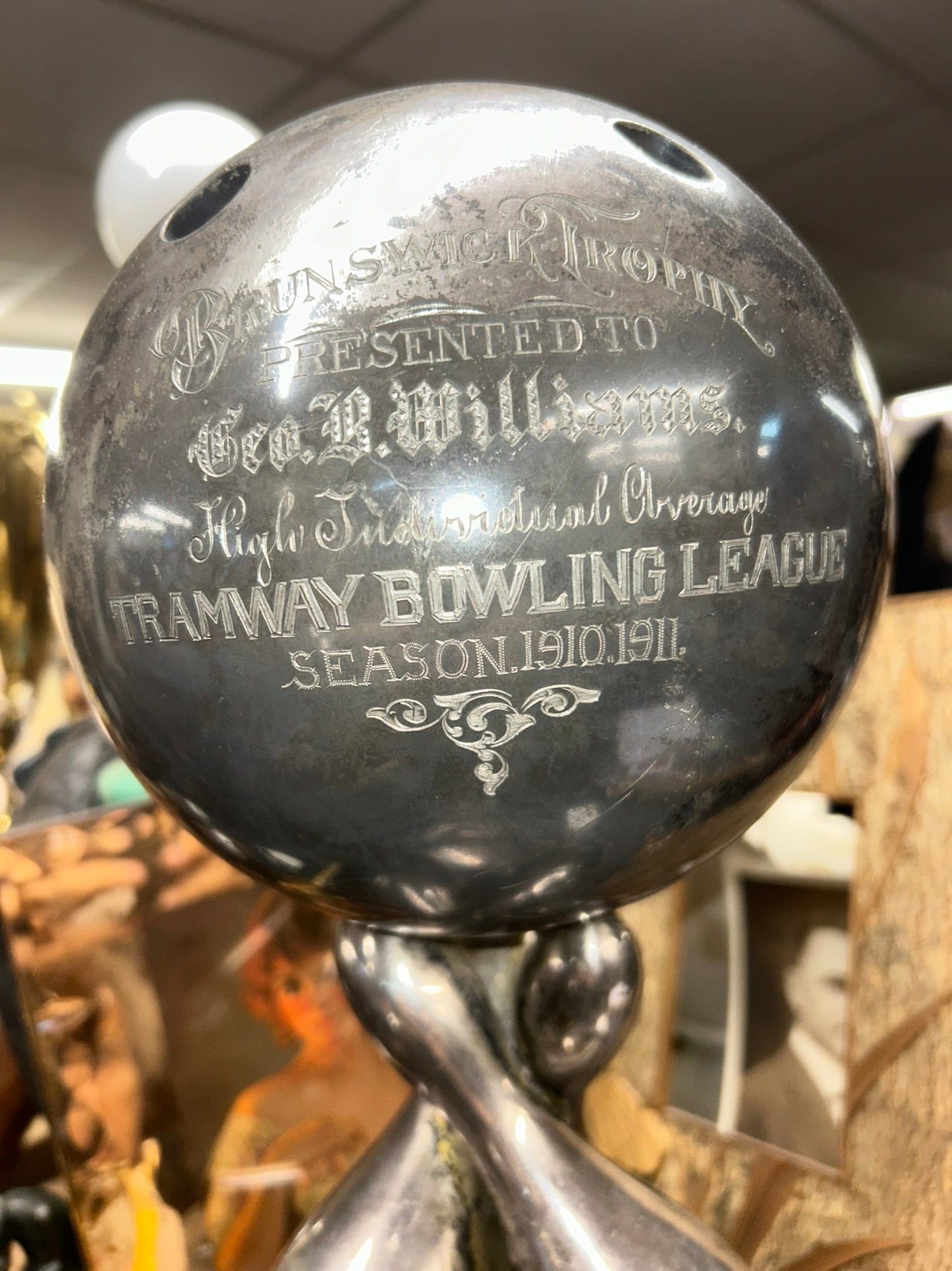 BRUNSWICK BOWLING FIGURAL BALL AND PINS TROPHY 1911