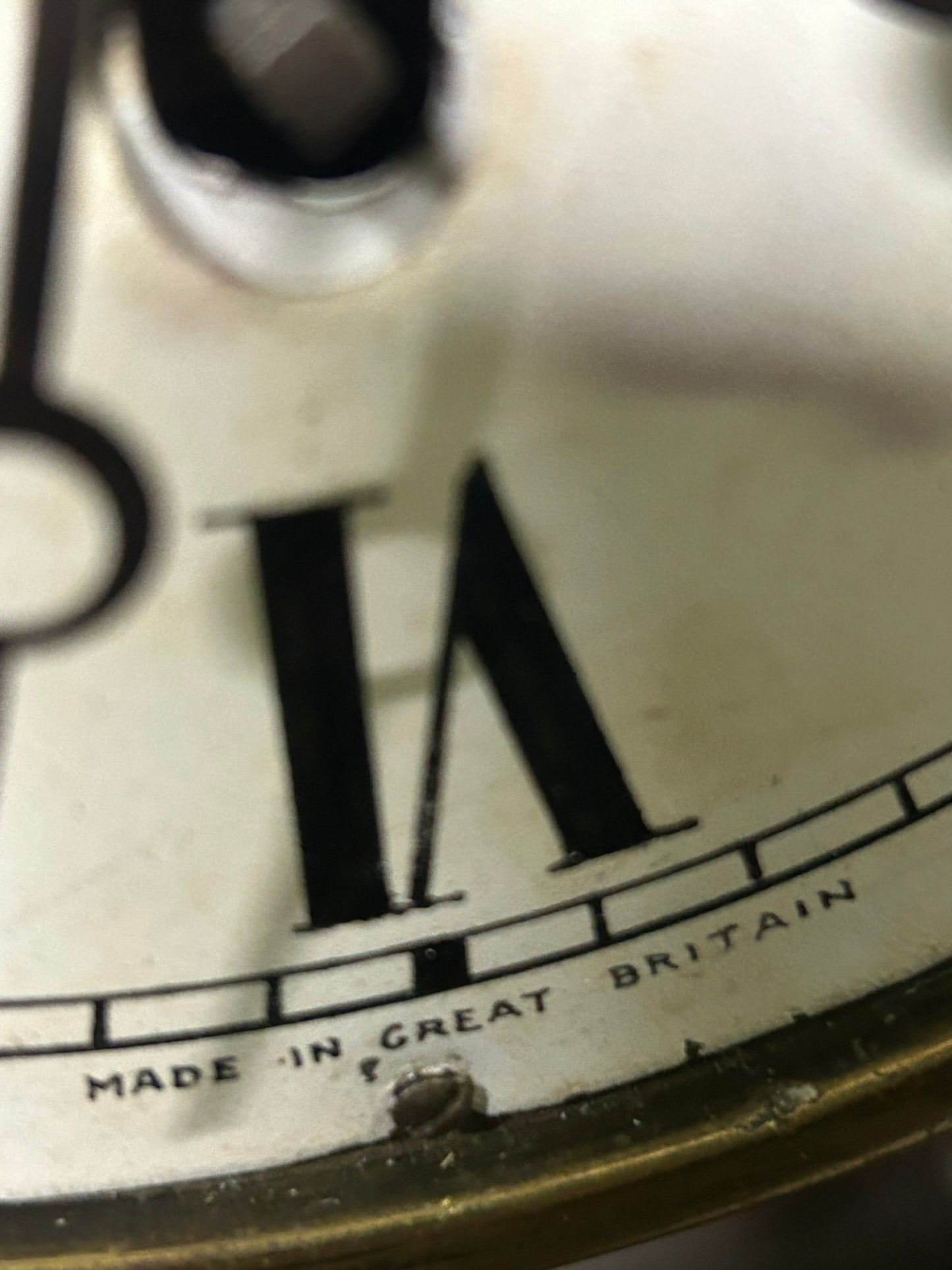 ANTIQUE WOOD SHIP'S WHEEL WITH ANTIQUE BRASS CLOCK IN CENTER