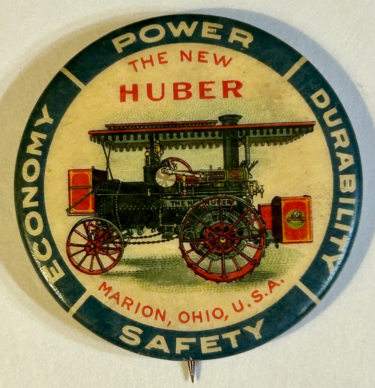 THE NEW HUBER ANTIQUE ADVERTISING PINBACK BUTTON